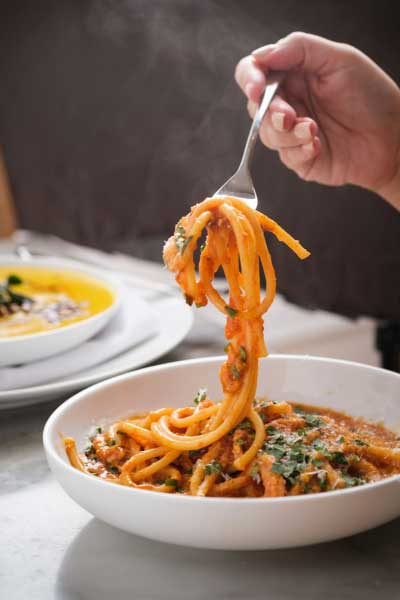 Employee sitting at a table enjoying a meal